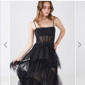 Oly tiered ruffle tulle gown in black by bcbgmaxazria